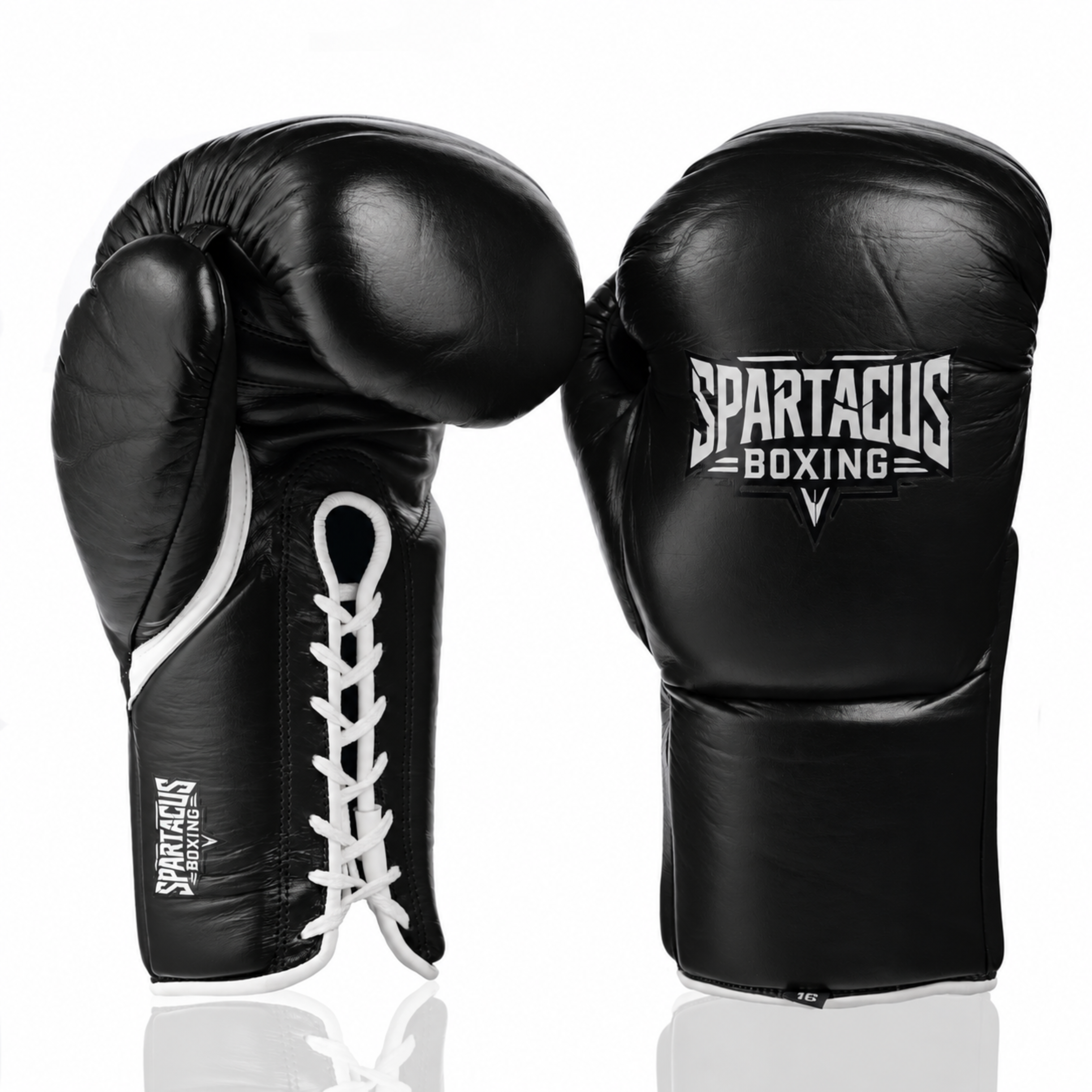 Black boxing gloves made with horsehair foam and latex foam. Black Boxing gloves with white piping