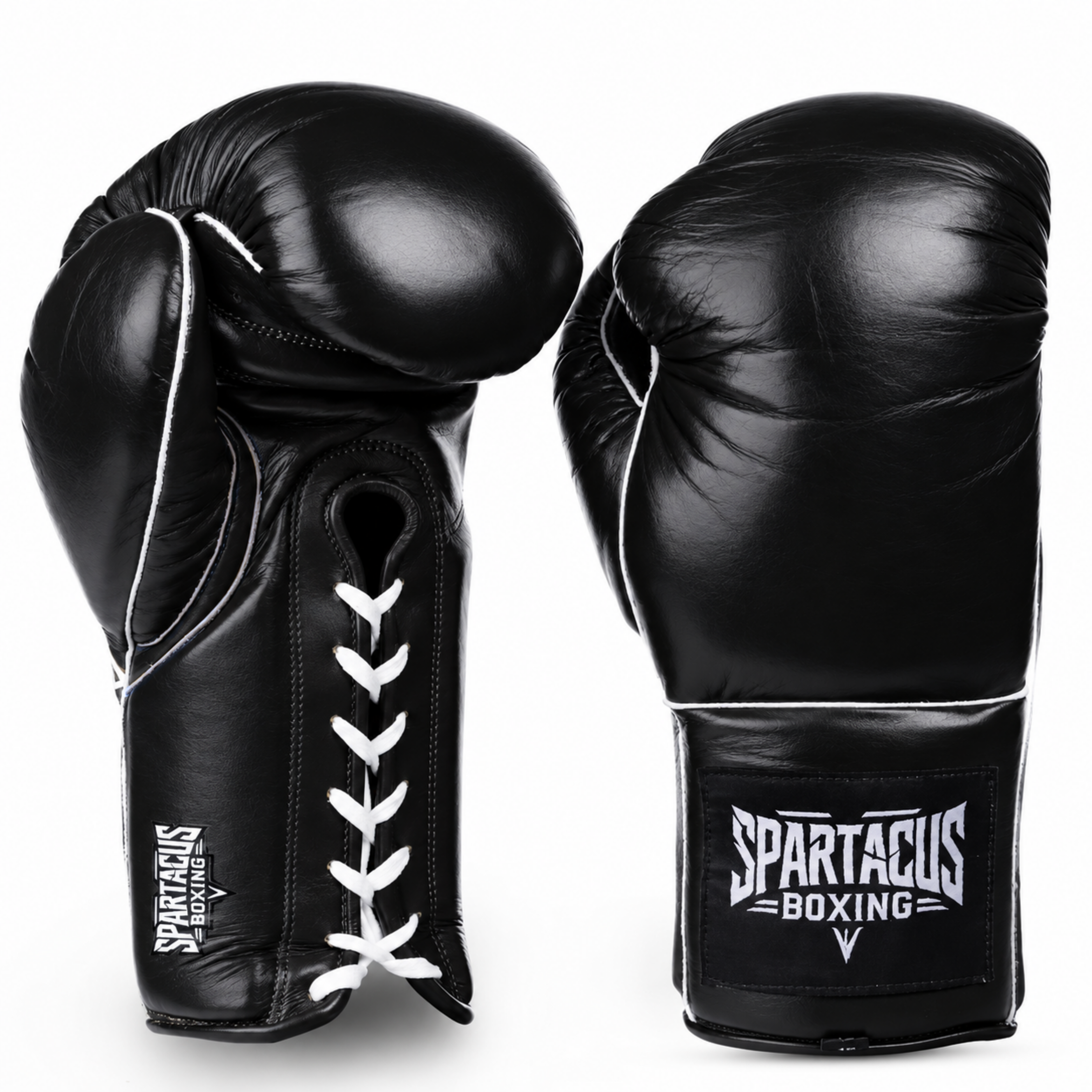 Vintage black boxing gloves with laces and a patch on the wrist
